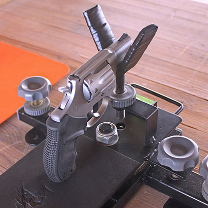 The Taurus 942 on a shooting rest at the range during testing.