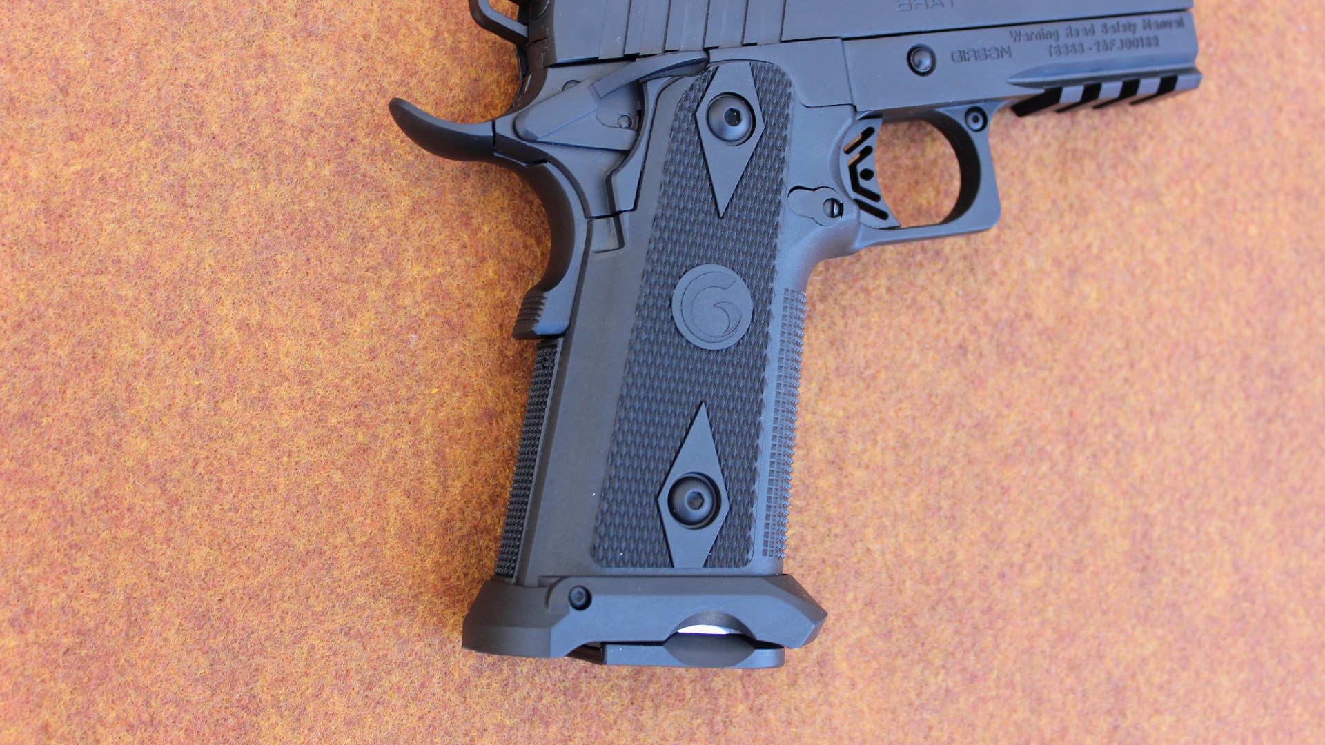 EAA Brat Witness2311SC view of right-side grip frame gun pistol texturing