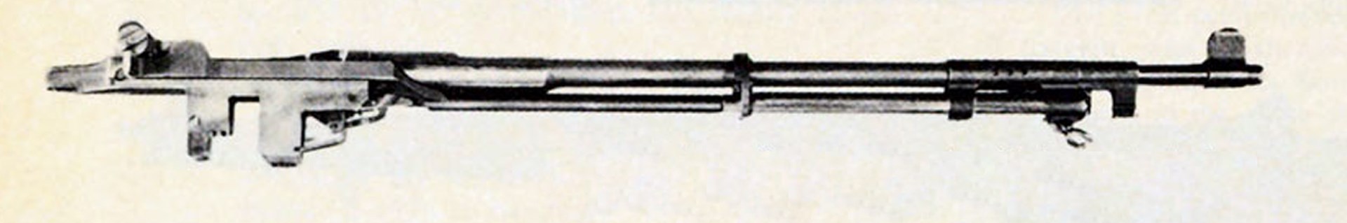 M1E4 Rifle working parts with bolt retracted.