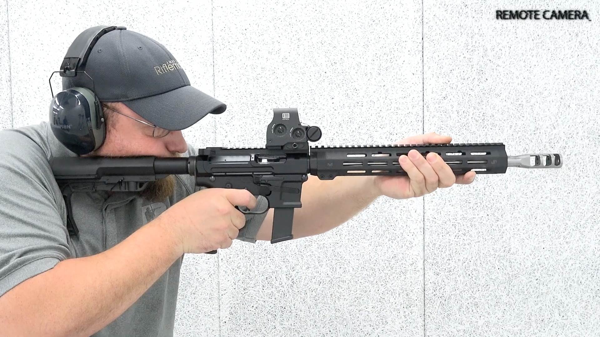 man shooting gun jp-5 steel challenge carbine remote camera shooting range