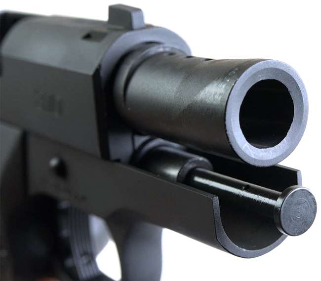 Black pistol with slide locked back showing muzzle, barrel ports, guide rod and frame on white background