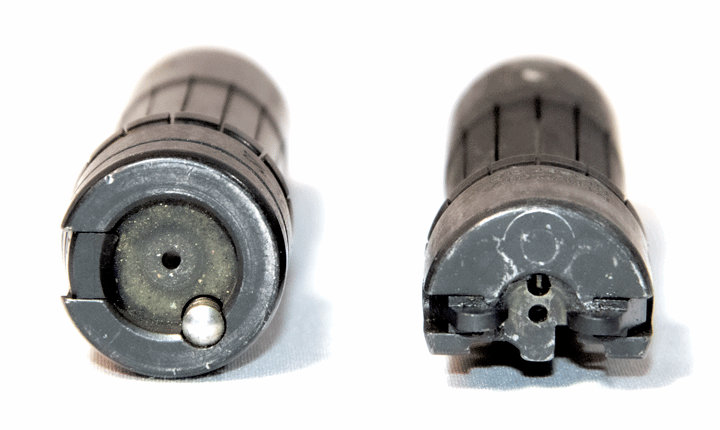 Rifle bolt heads shown on white.