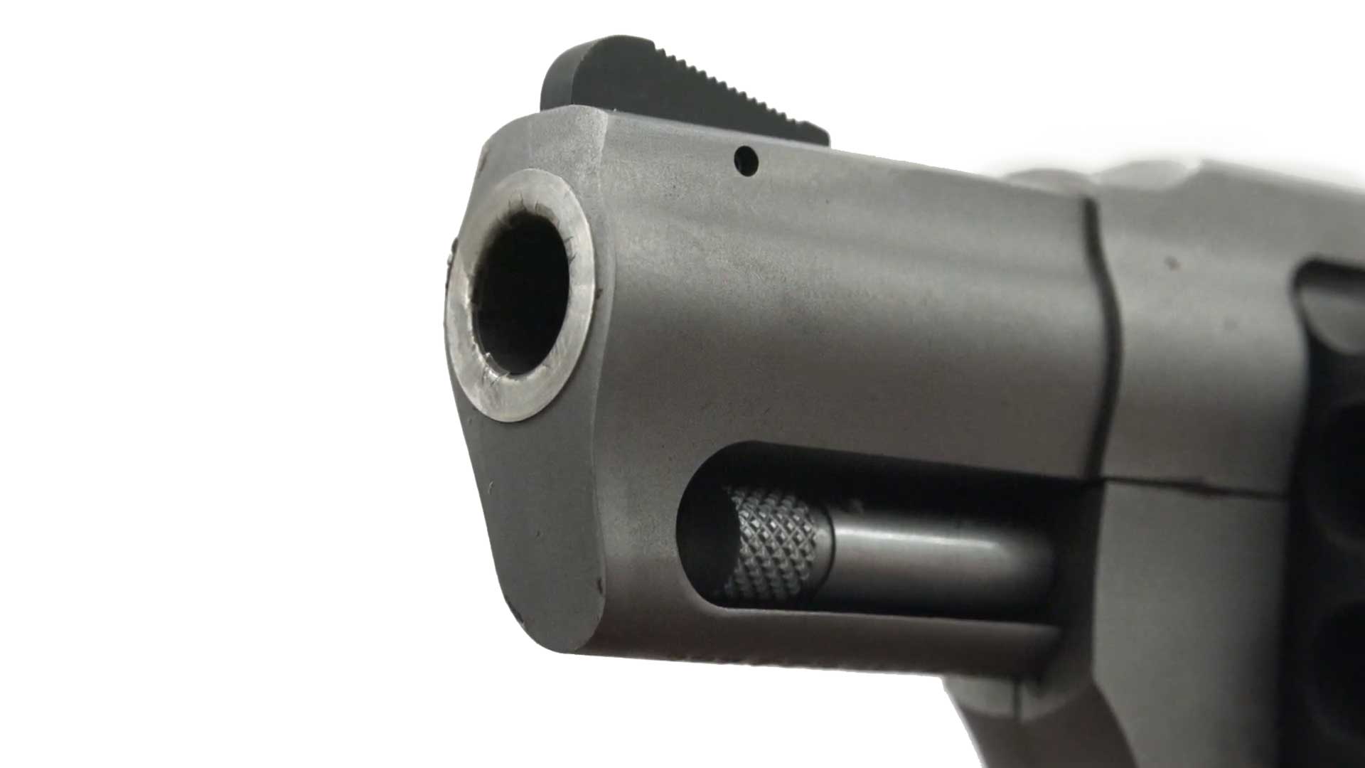 Taurus USA 327 revolver muzzle barrel bore gun left-side view stainless steel metal