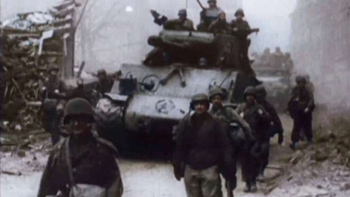 World War II tank and soldiers