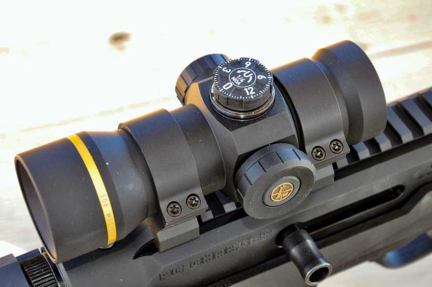 Leupold RDS gold-ring optic with turret cap removed showing hashmarks of the dial