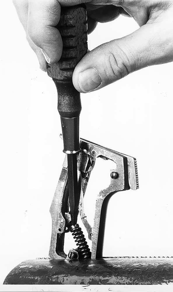 hand fingers screwdriver gun parts pistol frame spring metal