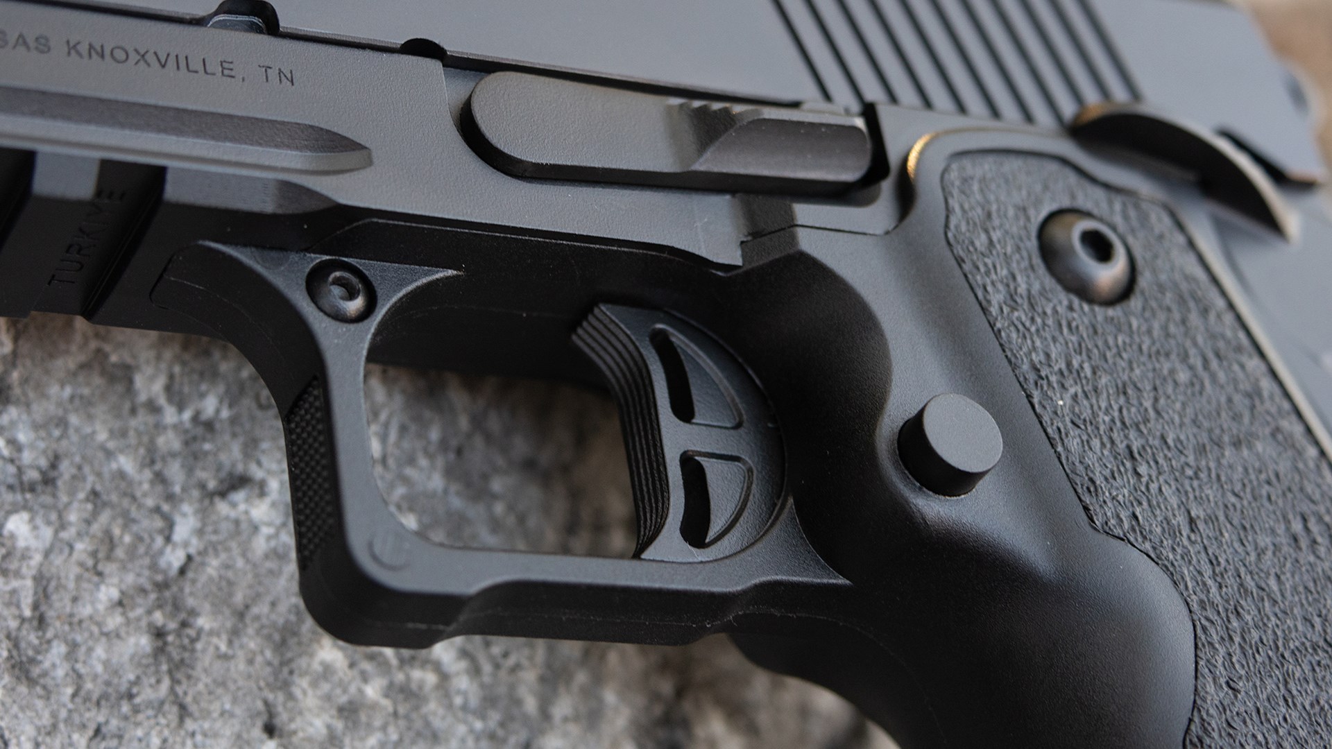 Trigger and hybrid frame design on the Tisas B9R DS pistol.