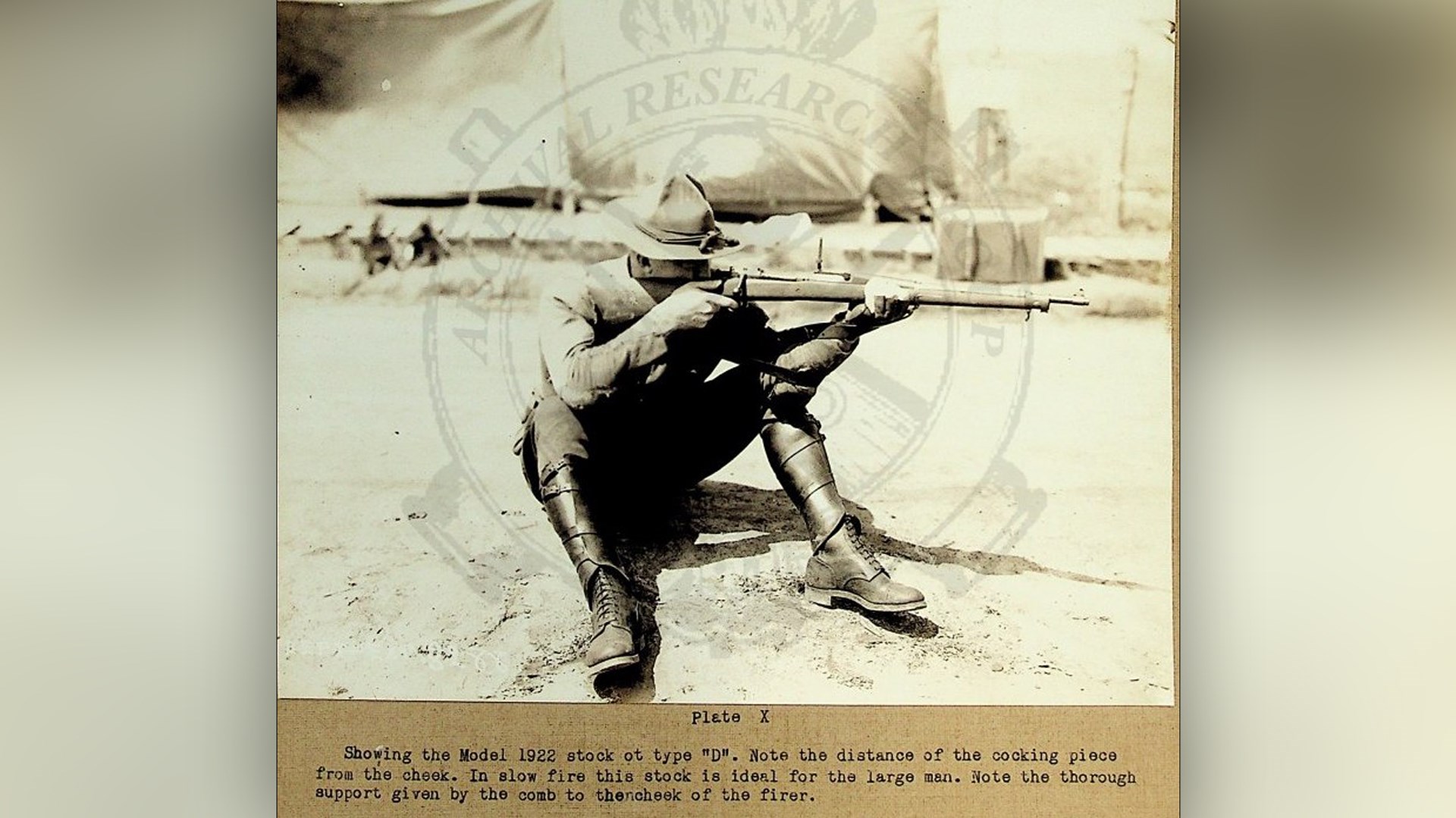 An officer using a M1922 stock. Note the lack of grasping grooves on this arsenal production stock. While “ideal for the large man” in slow fire, and providing “thorough support” to the cheek, it could be difficult to manipulate in rapid fire, especially for shorter men.