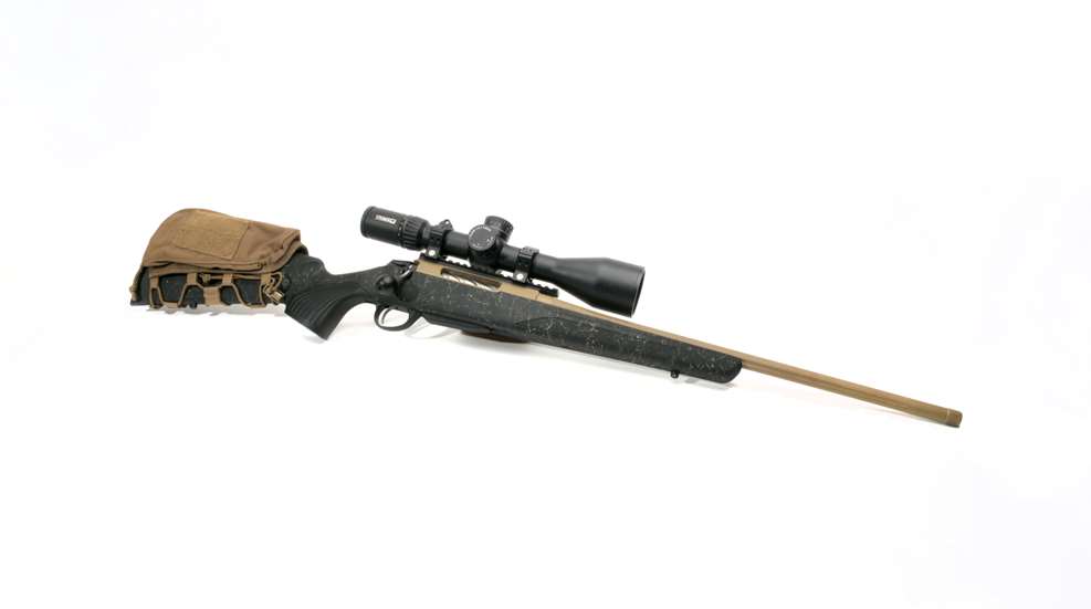Tikka T3x RoughTech Superlite bolt-action hunting rifle right-side view shown with accessories riflescope buttstock pack
