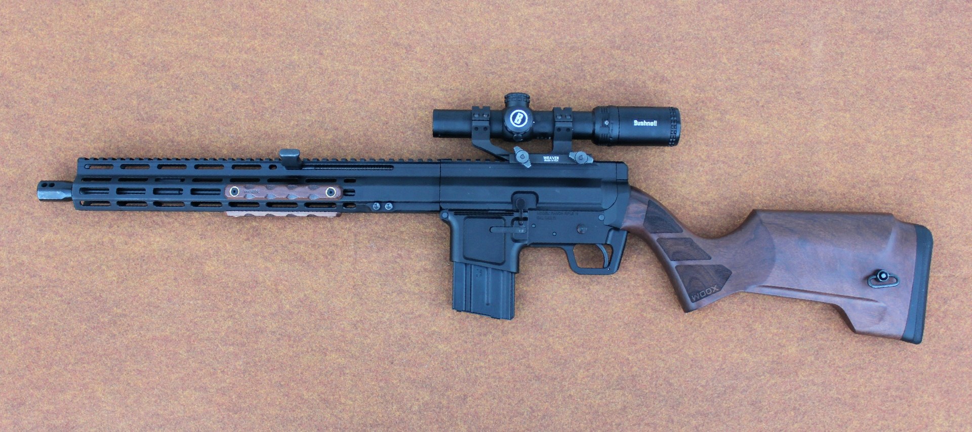 FM Products Rancher Rifle left-side view semi-automatic gun with woox wood buttstock bushnell riflescope black metal material