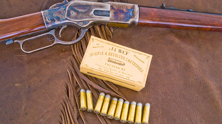 A Uberti made Winchester Model 1873 lever-action rifle with .44-40 WCF cartridges.