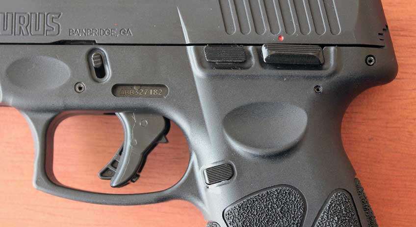 left side Taurus G3c frame trigger black plastic gun frame metal slide serrations