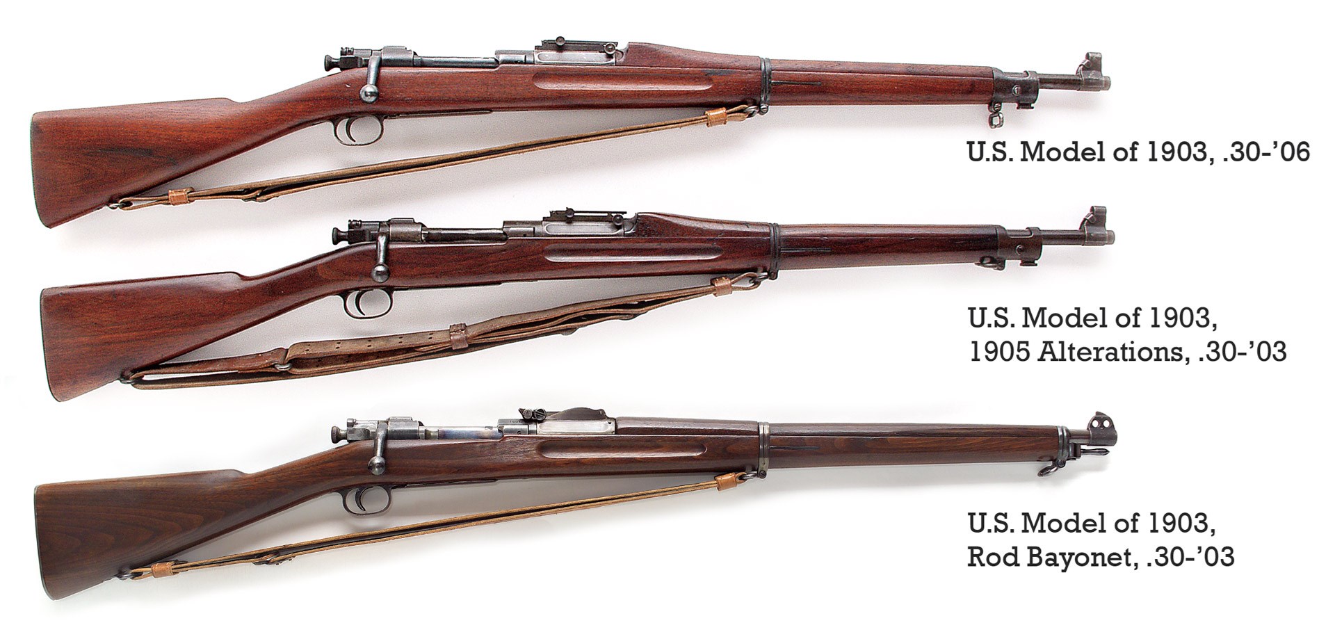 stack of U.S. Springfield Model of 1903 bolt-action rifles model variations comparison