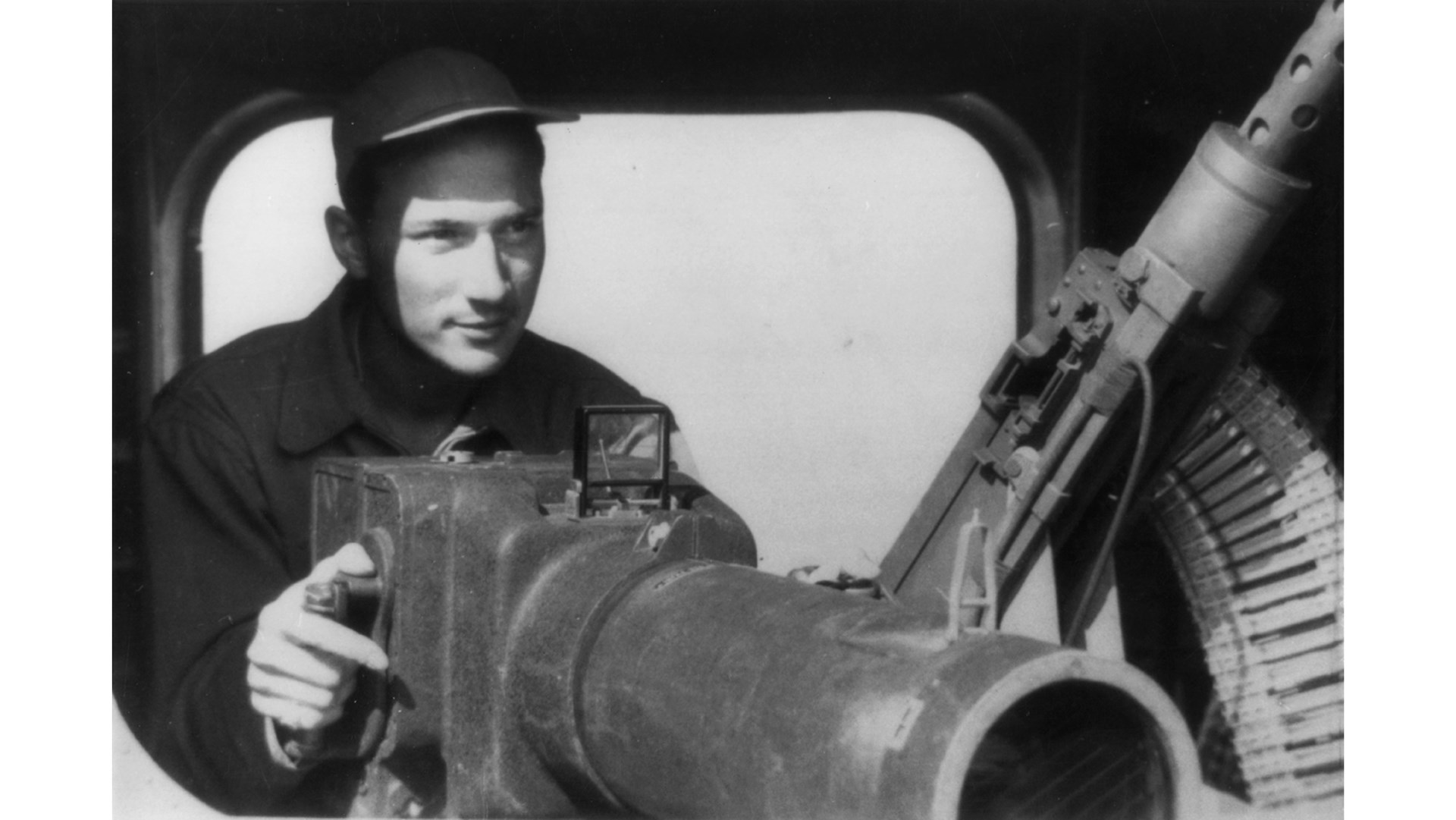 Photographer-gunner Stoutsenberger, veteran of Europe, Africa, and Middle East; wearer of Distinguished Flying Cross, the Air Medal with two Oak Leaf Clusters, and 15th Air Force Citation with two Oak Leaves.