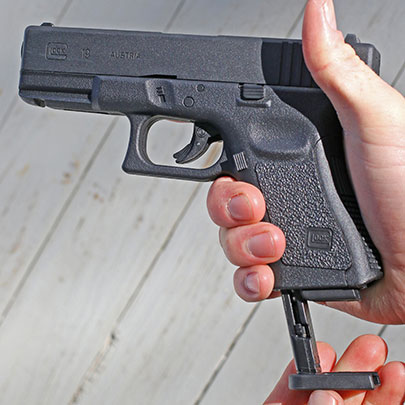 The 15-round magazine of the Umarex Glock 19 Gen 3 fits into the grip just like a conventional magazine and is released by a magazine button in the same position as that on a centerfire Glock 19.