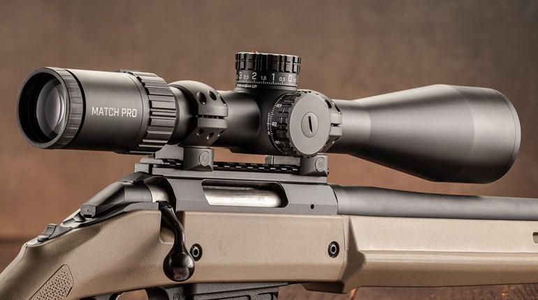 Bushnell Match Pro ED 5-30X 56 mm riflescope attached to ruger bolt-action rifle flat dark earth stock