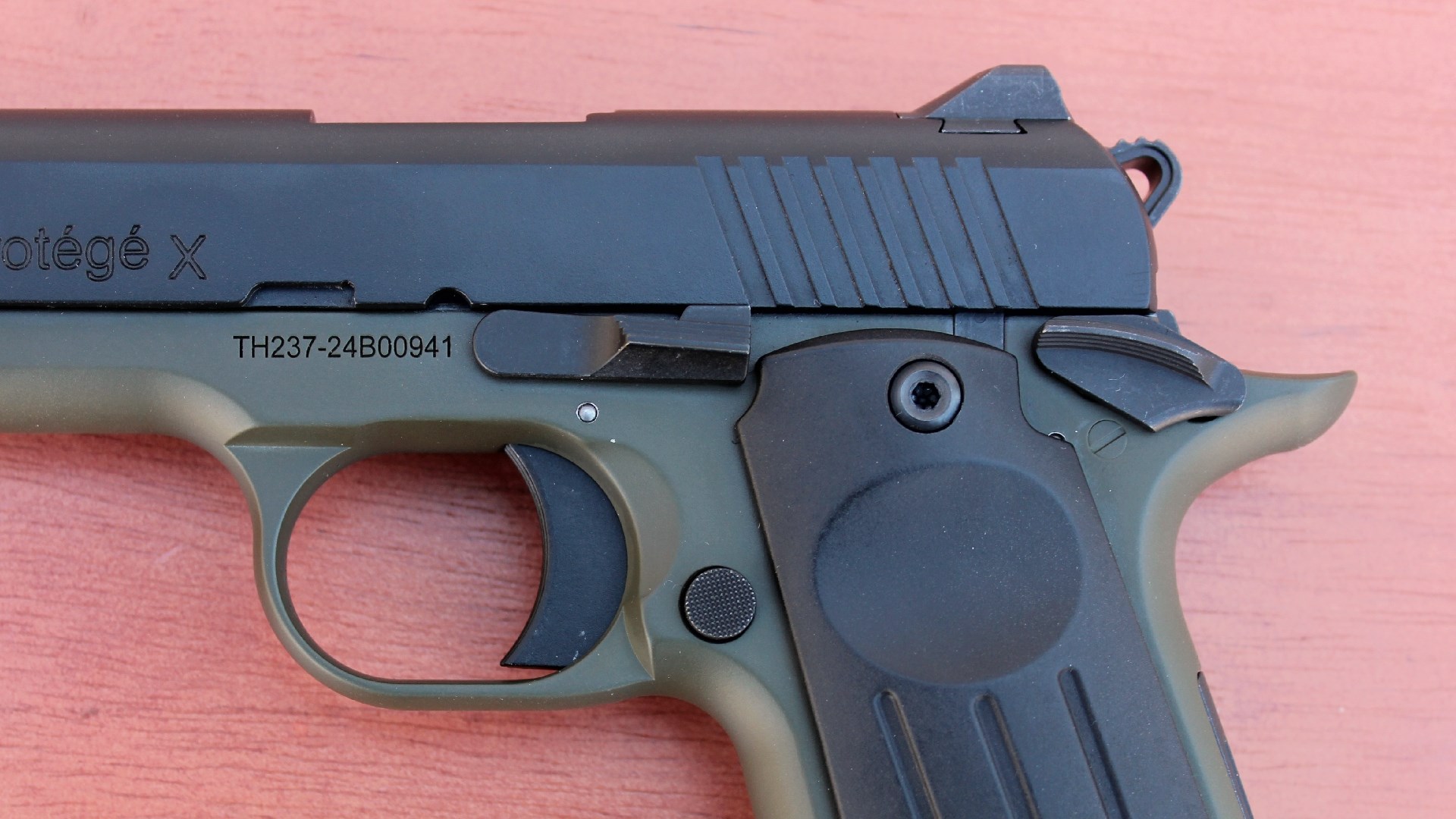 Thumb safety, trigger, slide stop lever and magazine release on the left side of the TriStar Arms Protege X.