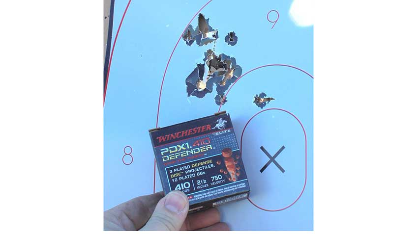 winchester pdx1 ammunition .410-bore load shell target holes grouping hand fingers
