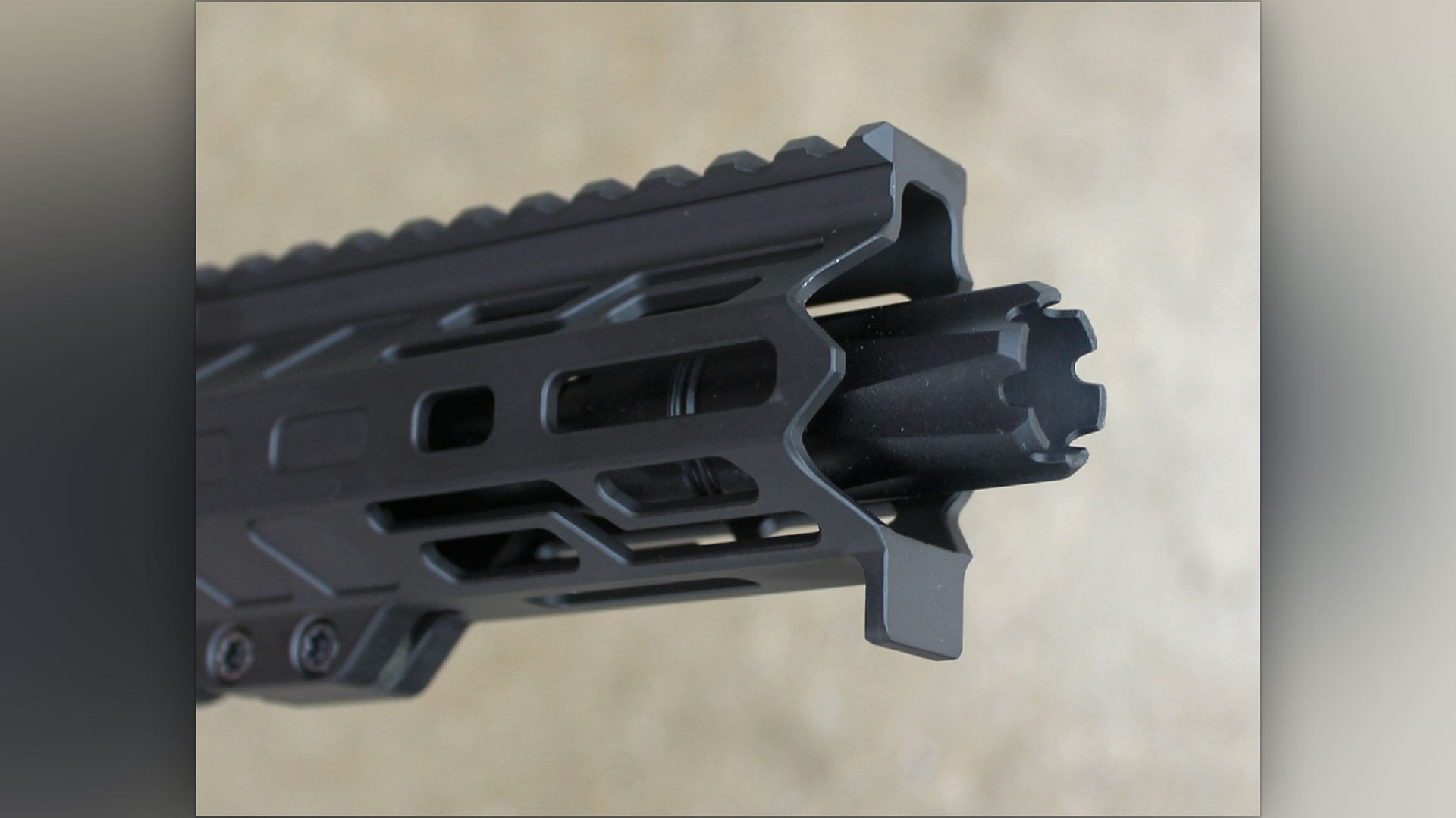 CMMG Mk4 Banshee .22LR pistol handgun muzzle barrel gun parts closeup