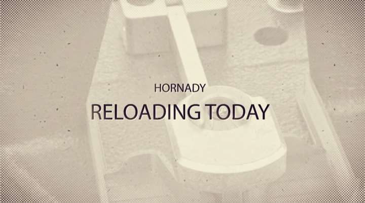 Text on faded reloading press image stating &quot;Hornady: Reloading Today&quot;