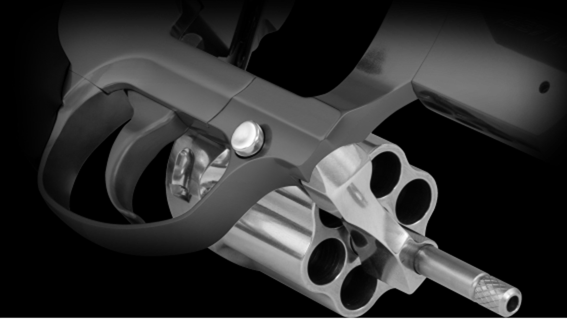 A highlighted push-button release on the front of the trigger guard for the Diamondback SDR's cylinder crane.