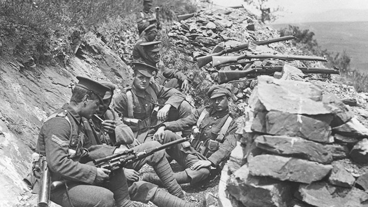 Men of the British 9th Battalion in a shallow trench with both Galilean sights and a telescopic sight on their SMLEs. Note the SMLEs on the ledge have Galilean sights.
