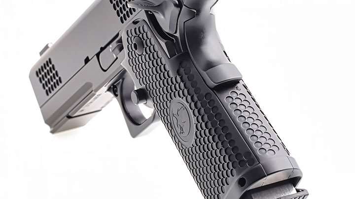 Unique dimpling patterns on the slide match the same pattern found on the aluminum grip panels. These dimples provide a good surface for grasping the slide. The dimples are not abrasive, but they are aggressive enough to provide a slip-resistant surface.
