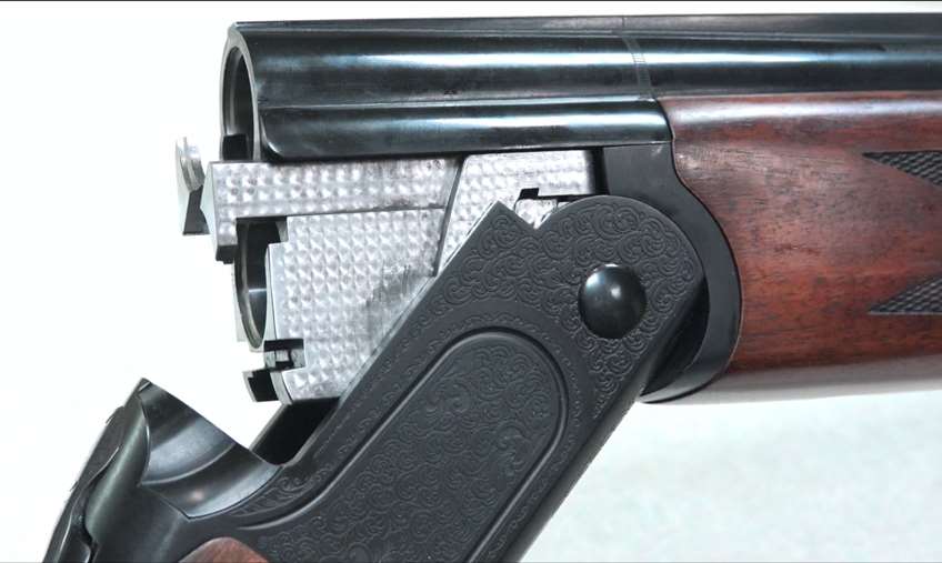 shotgun action open silver metal black steel brown wood