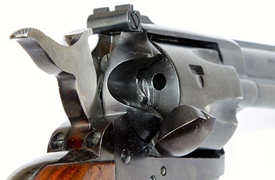 The rear of the Great Western &quot;The Deputy&quot; revolver shown with the loading gate open and the hammer at half-cock.