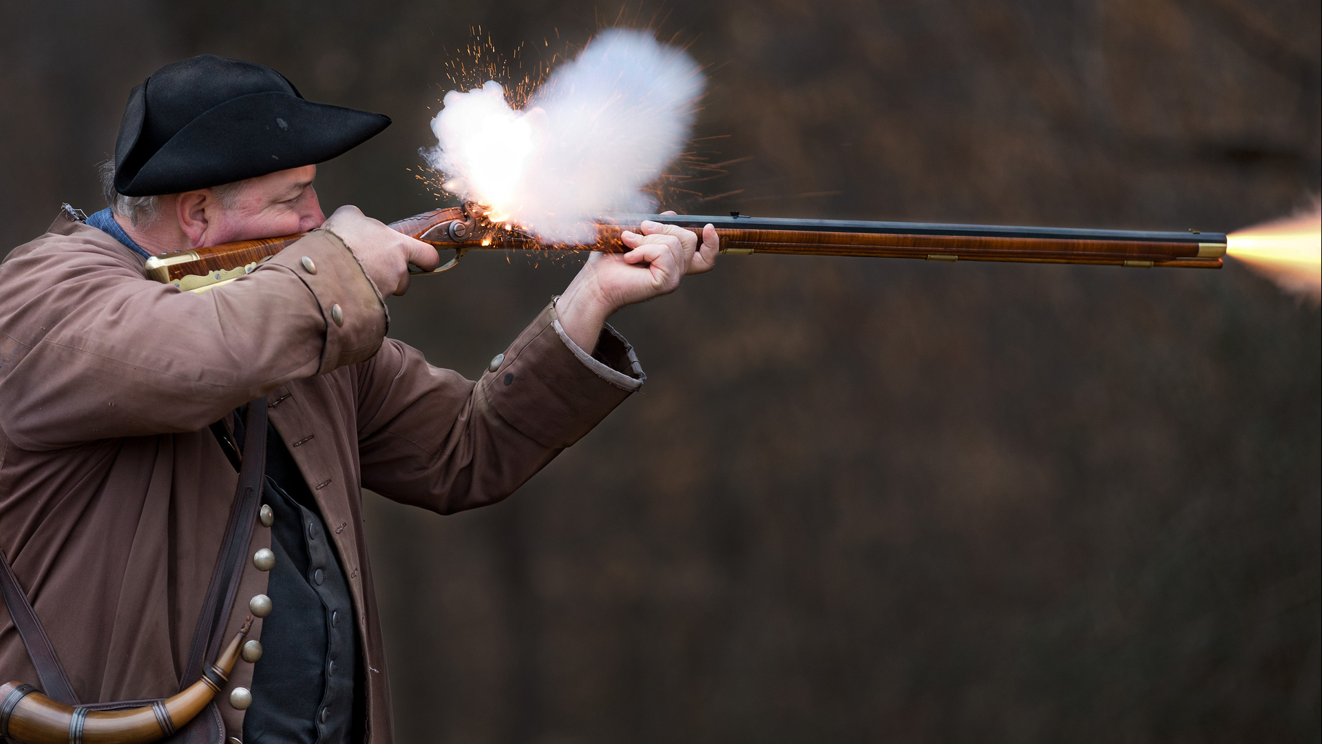firing a musket rifle
