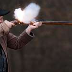 firing a musket rifle