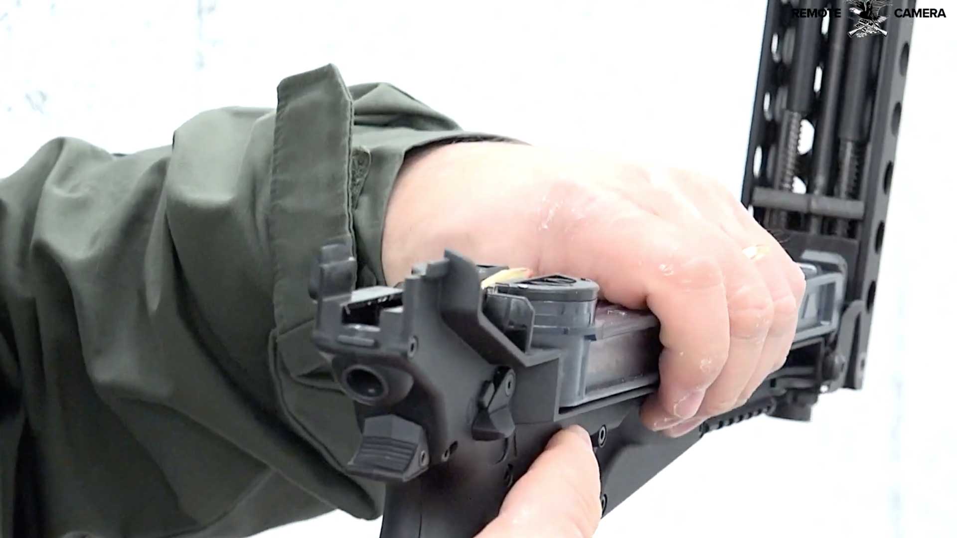 gun in hands disassemble pistol black plastic metal