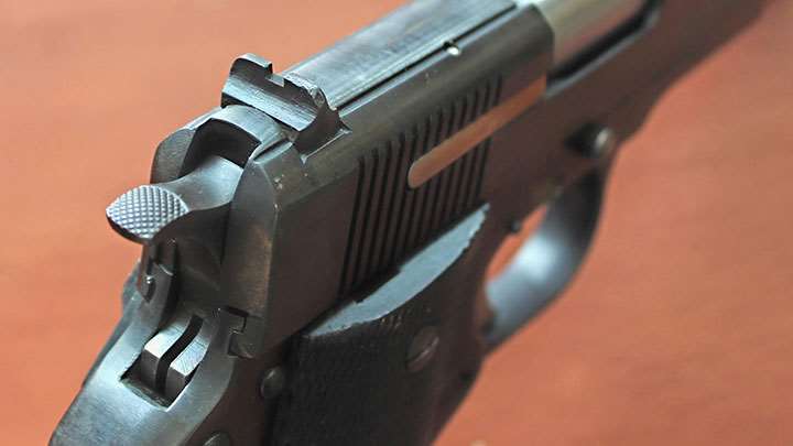 A view of the hammer and rear sight of the Star BM.