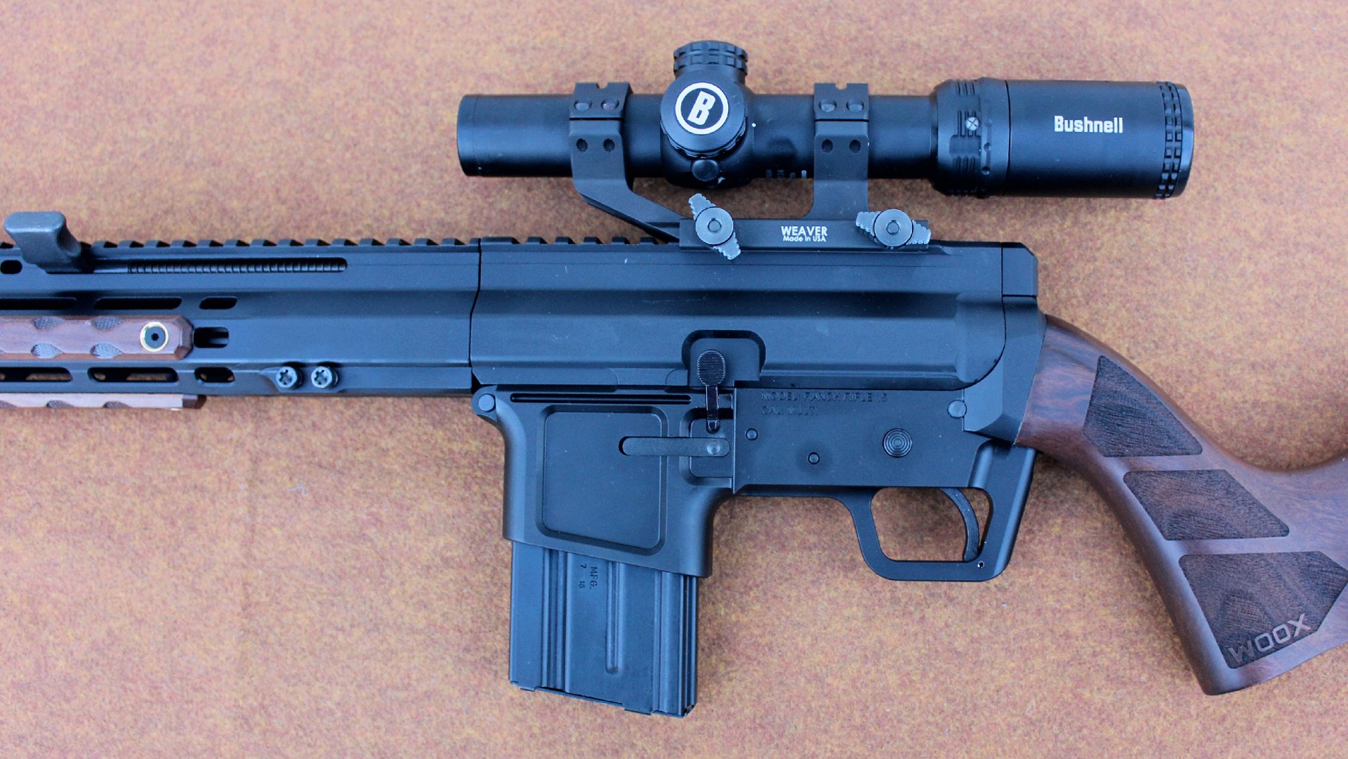 FM Products Ranch Rifle left-side, mid-section view gun rifle semi-automatic black aluminum controls shown with bushnell riflescope and woox wood stock