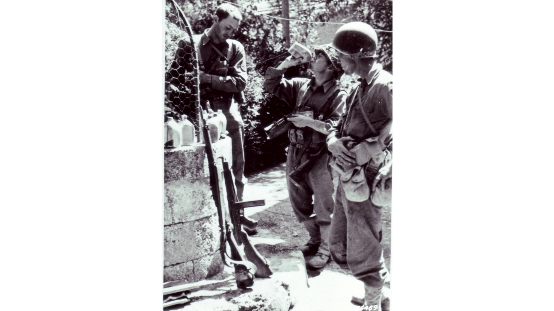 The old and the new: The GIs carry a wide range of small arms on Sicily, including a M1 Thompson SMG, a M1903 Springfield rifle, and a M1 Garand rifle. The semi-automatic M1 was still being integrated into combat units in the MTO until well into 1944. NARA