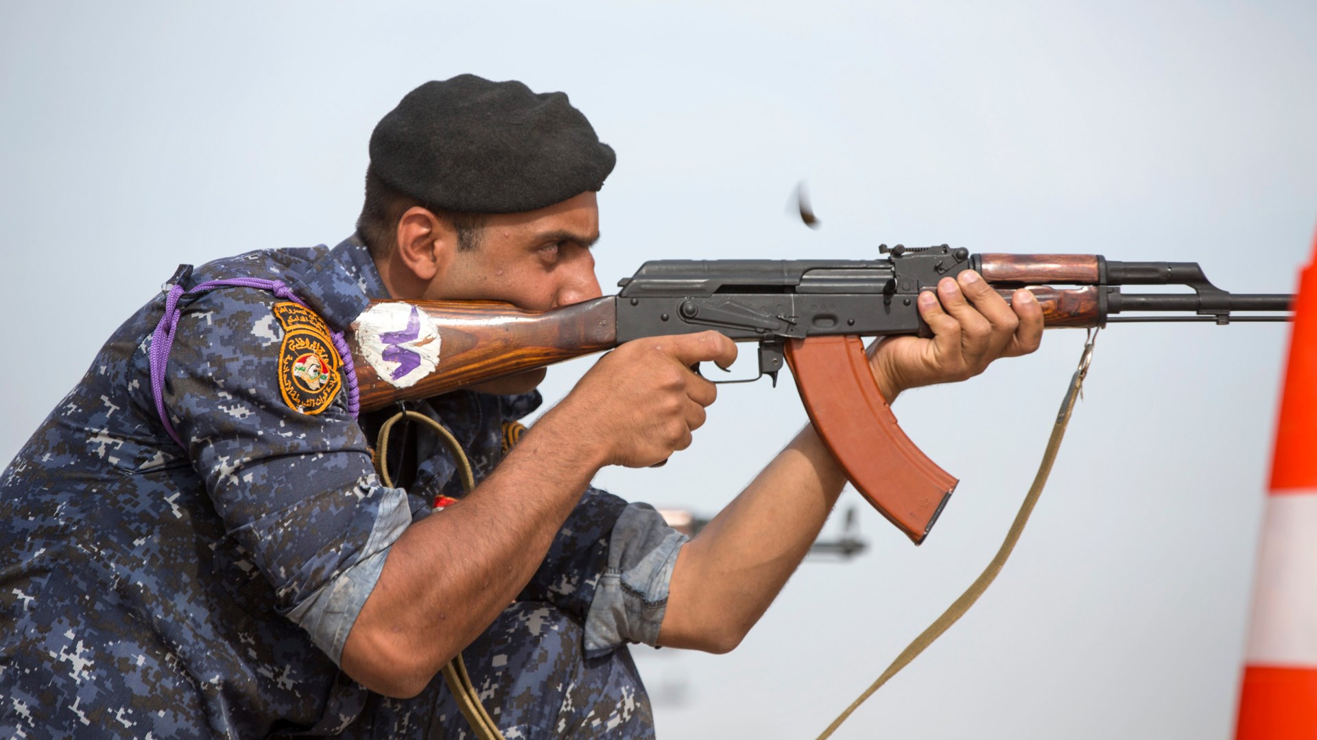 A member of the Iraqi security forces fires an AKM during short-range marksmanship training led by Spanish Guardia Civil at the Besmaya Range Complex, Iraq, on May 23, 2017. (U.S. Army photo by Cpl. Tracy McKithern)