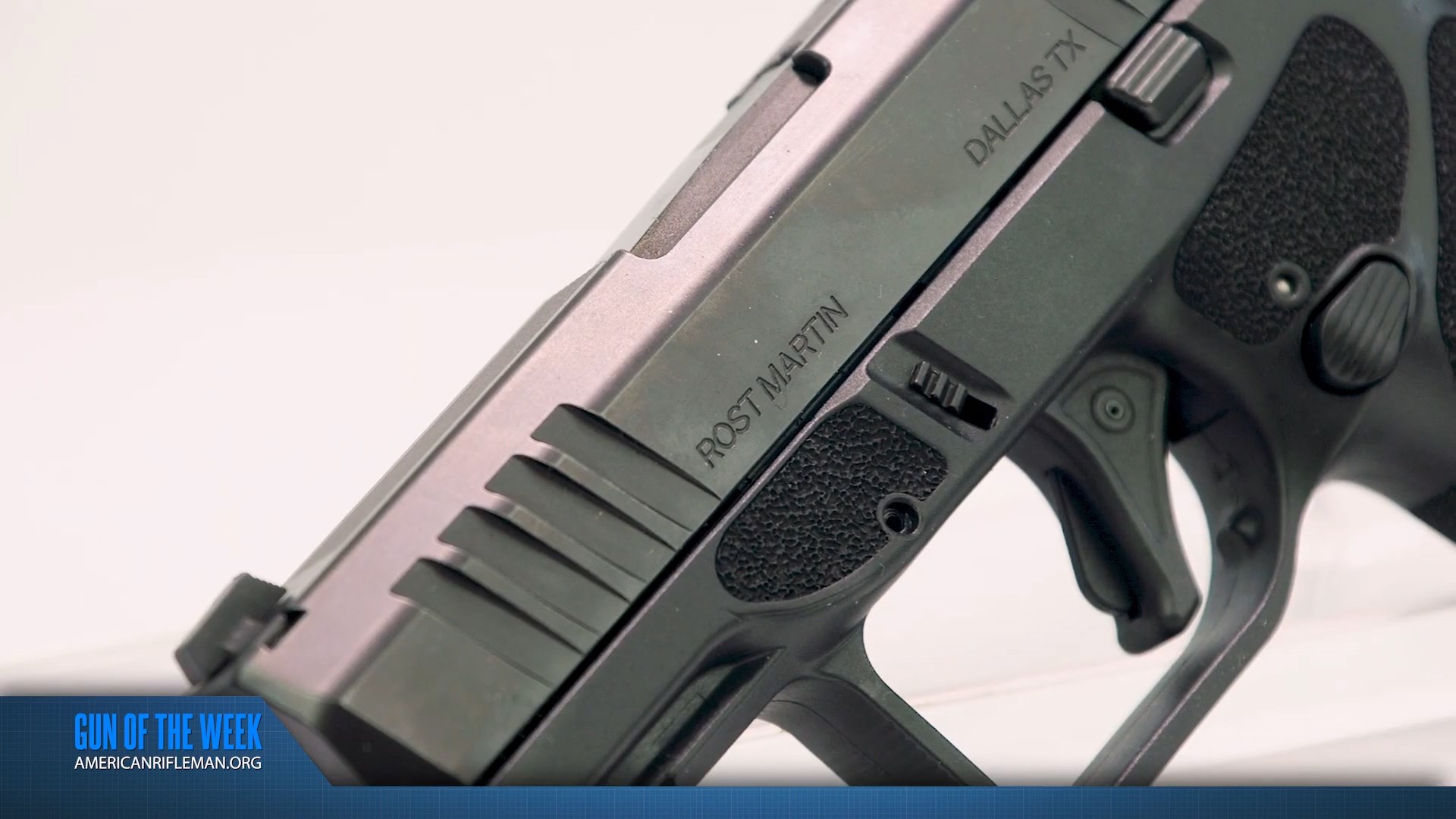 Rost Martin RM1S handgun pistol closeup of left-side steel slide markings