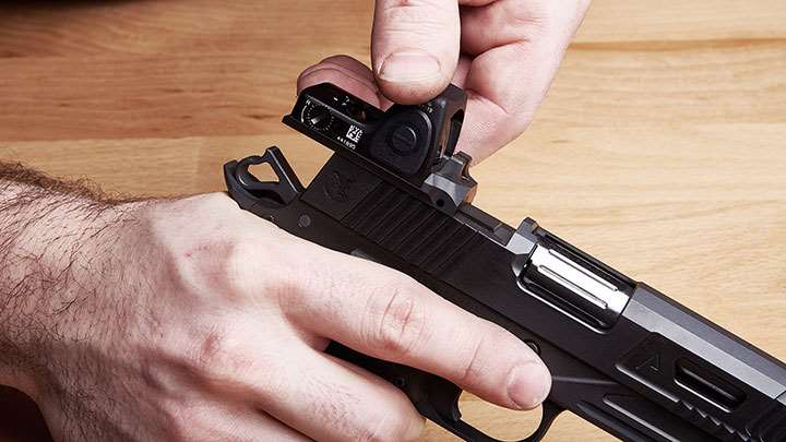 Nighthawk Custom’s innovative IOS (Interchangeable Optic System) for those who desire optic compatible handguns. The IOS allows for a low profile RMR mount with the versatility to switch to rear sight in a matter of seconds.