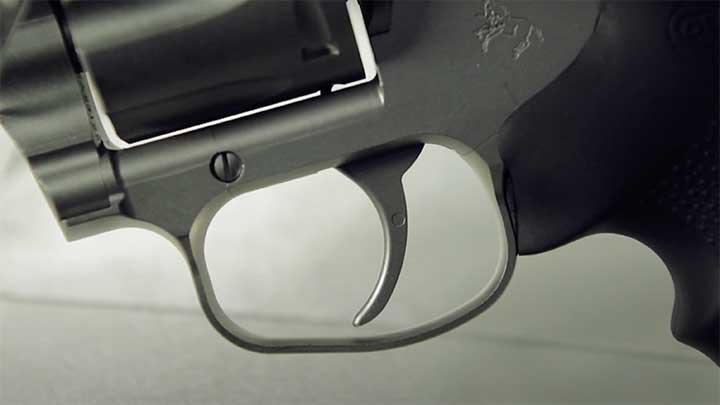 The trigger shoe was re-profiled and the trigger-guard widened to provide more area.