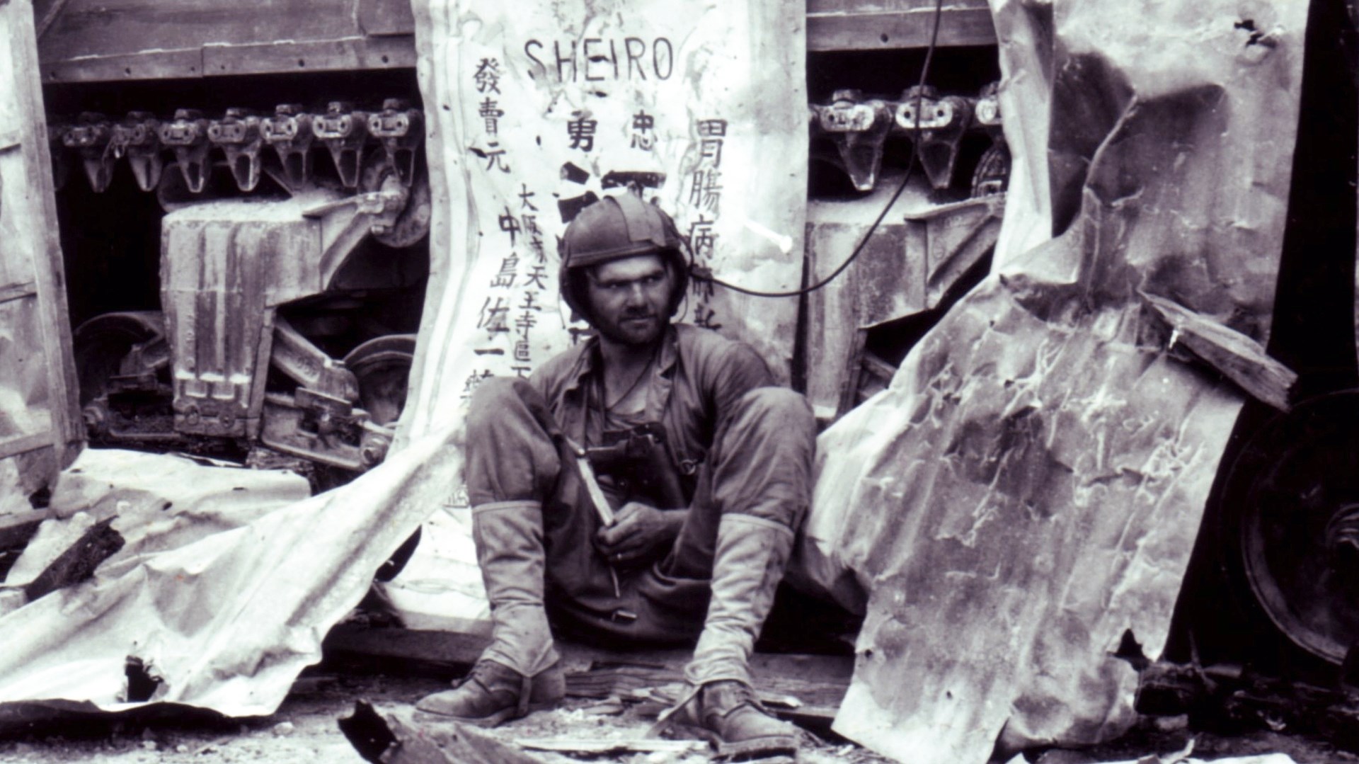 A Marine tanker wearing an M1911 pistol in a shoulder holster