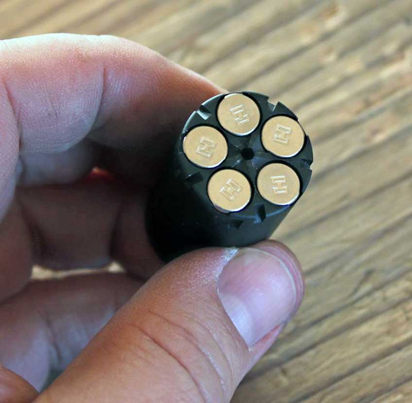 NAA Black Widow revolver cylinder in hand brass hornady rimfire cartridges