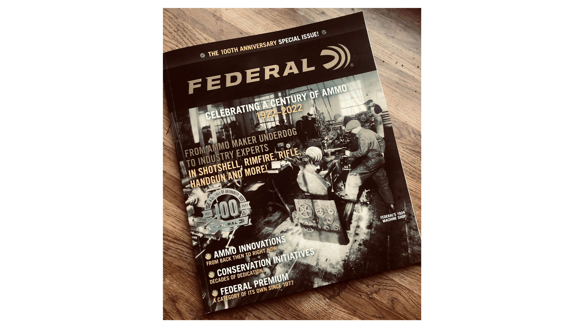 magazine cover special edition Federal Premium 100th anniversary tribute book on table