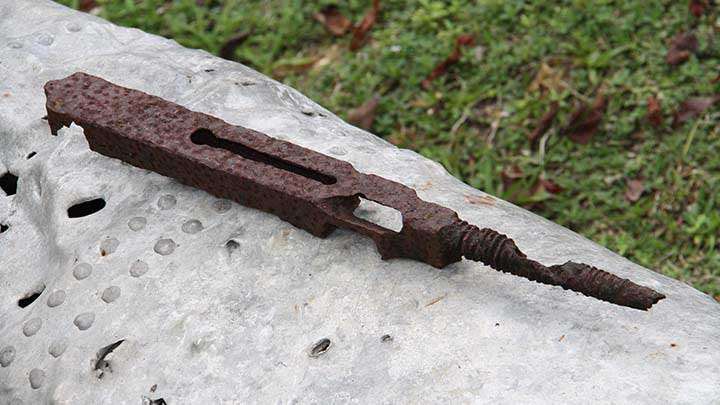 The upper receiver of a relic condition M1928A1 Thompson submachine gun found near Peleliu’s old airfield in March, 2014.