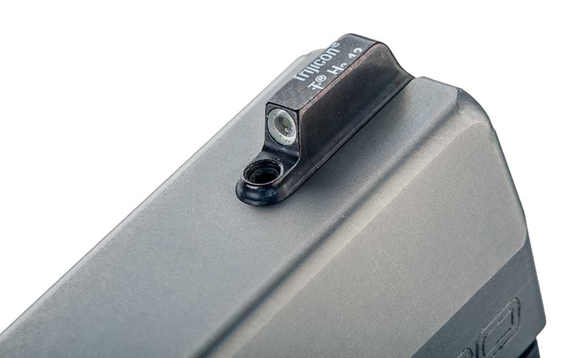 Front of the Beretta Pico slide on white showing Trijicon front-sight blade.