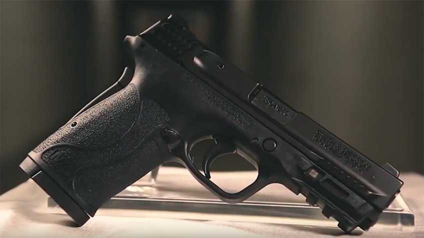 Right-side view of Smith &amp; Wesson M&amp;P9 Shield EZ pistol on dark background.