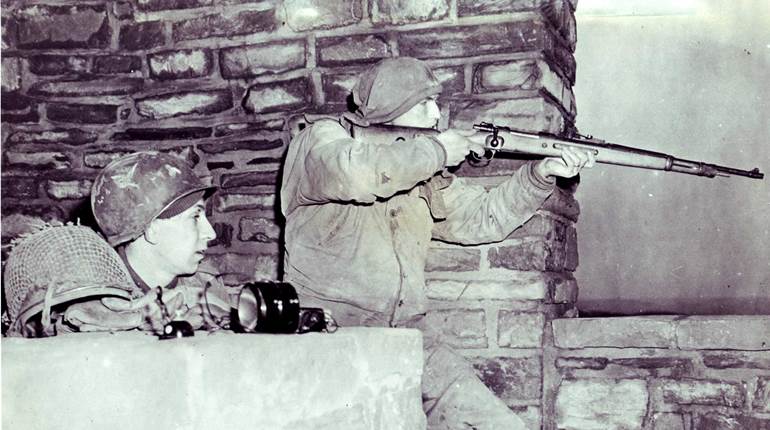 U.S. Troops Using Captured Small Arms in World War II | An Official Journal Of The NRA