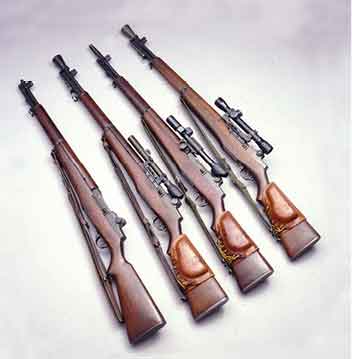 The M1 Garand rifle (l.) was adapted for sniping with the addition of a Griffin & Howe side mount and the M82 scope as the M1C (second from l.), it lies next to an M1D with an M84 scope attached to a barrel mount. At top right is a USMC 1952 sniper rifle with Kollmorgen USMC scope in a Griffin & Howe mount.