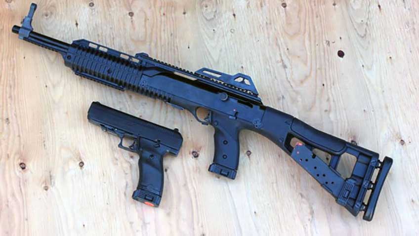 left-sides two guns pistol handgun carbine rifle black on wood