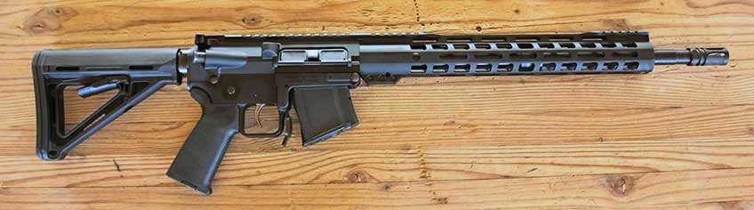 right side black semi-automatic AR-15 gun