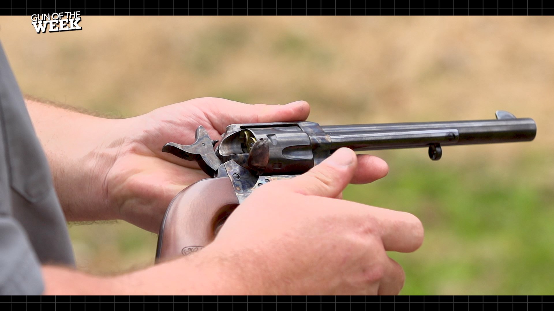 Outdoors GUN OF THE WEEK revolver Cimarron Model P in hands side profile